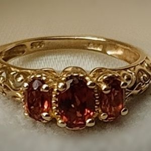 Genuine 3 stone garnet ring